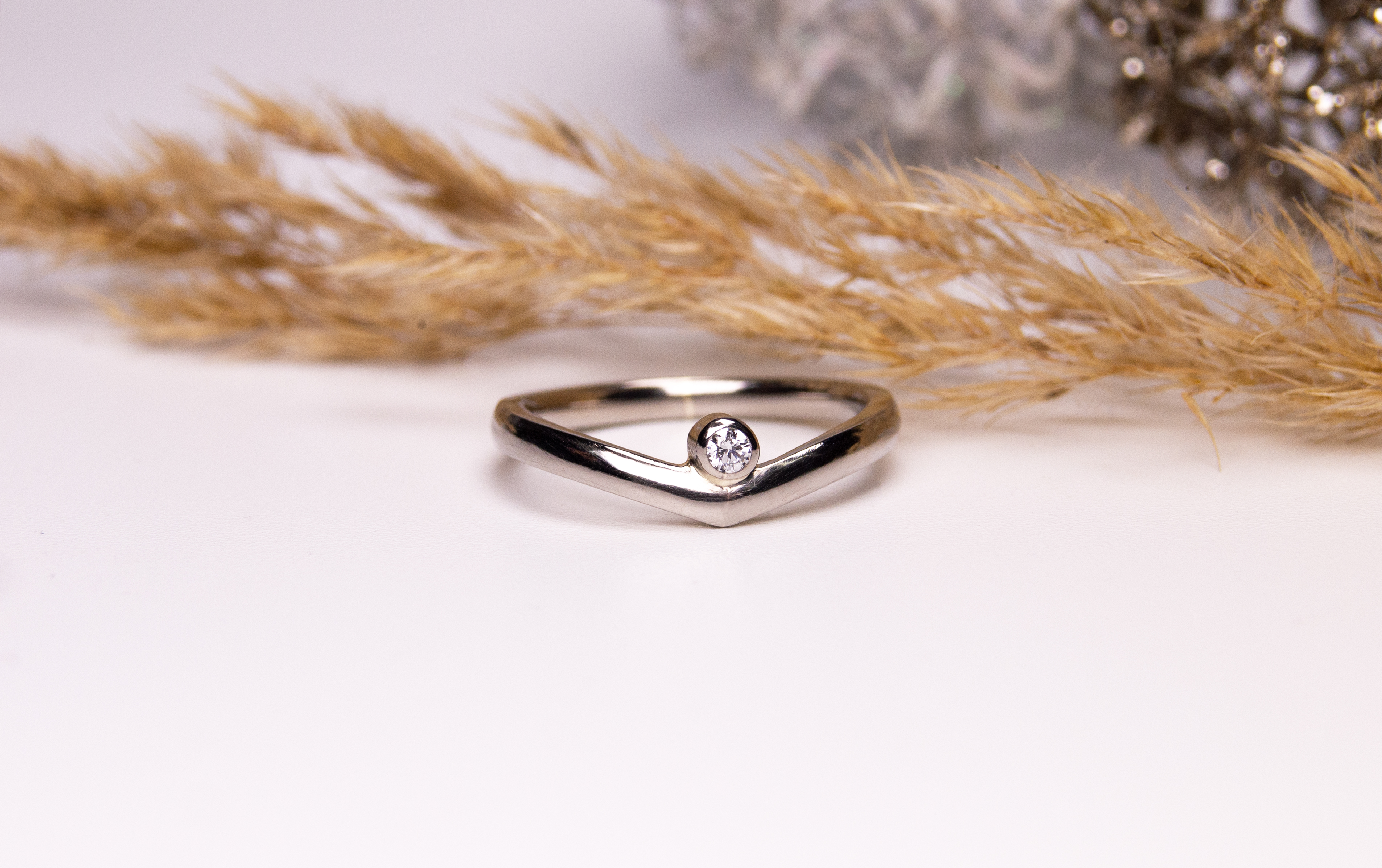 Verlobungsring in Palladium mit Brillant